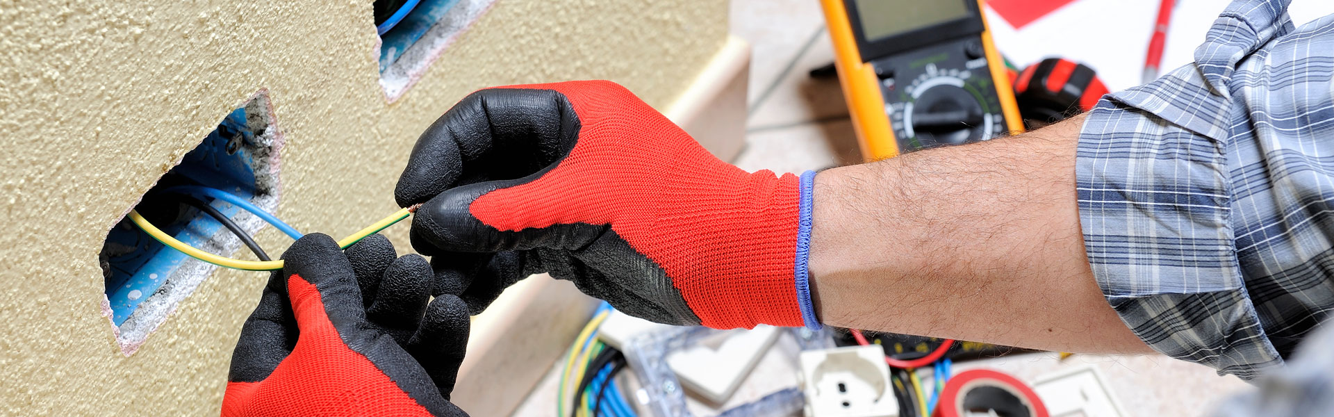 Electrician Working on Residential Electrical Installation